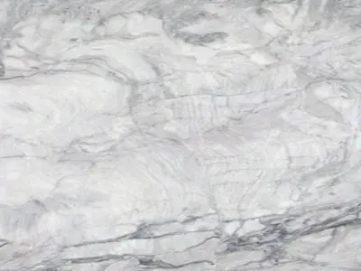 Gray and white natural stone texture with natural veins and swirls.