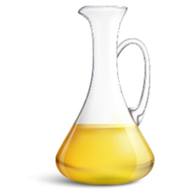 Transparent glass pitcher containing orange liquid, isolated on a granite countertop.