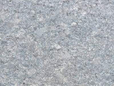 Close-up texture of a grey speckled natural stone surface.