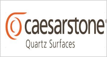 Logo of Caesarstone, a countertop company, featuring stylized orange text and a swirl, with "quartz surfaces" written below in gray.