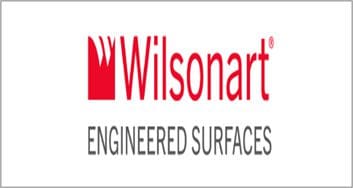 Logo of Wilsonart, a countertop company, featuring red and grey text with their tagline "engineered surfaces" under the brand name.