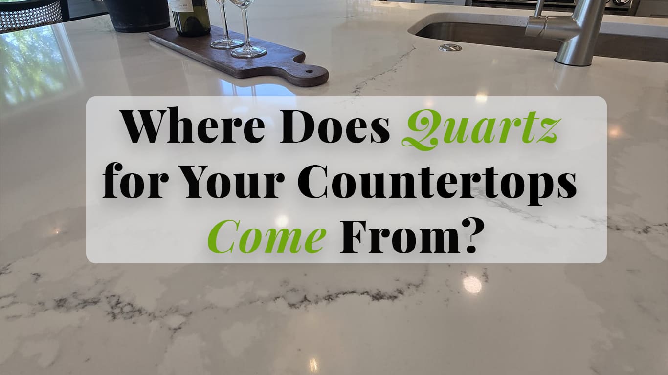 White quartz countertop with subtle gray veining, an integrated sink, and a polished surface in a modern kitchen.