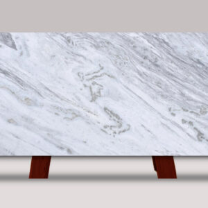 Full slab of Shadow Storm marble featuring a soft white background with flowing gray veining, displayed for custom marble countertop fabrication and installation.