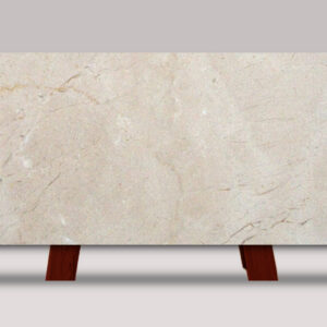 Full slab of Crema Marfil marble featuring warm beige tones, subtle veining, and soft natural stone variation.
