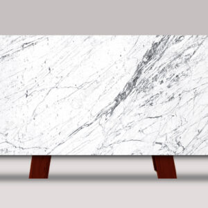 Full slab of Statuarietto marble featuring a bright white background with dramatic gray veining and natural stone movement.