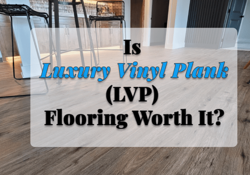 Luxury vinyl plank flooring installed in a modern open-concept kitchen featuring wood-look planks, bar seating, and durable waterproof flooring.
