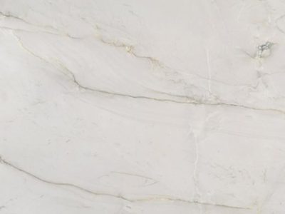 Close-up of Bianco Superiore Quartzite highlighting a soft white background with delicate gray veining and subtle natural movement.