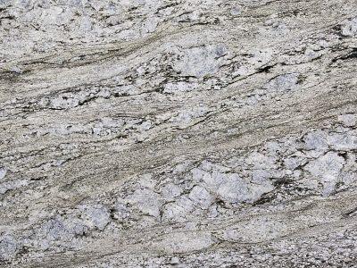 Close-up of textured gray and white granite surface.