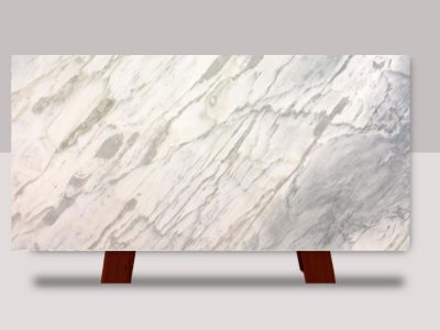 Full slab of Calacatta Splendor marble featuring a white background with dramatic gray veining and natural stone movement.