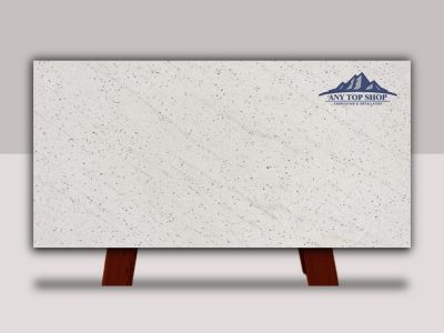 White marble slab with subtle veining, displayed on a wooden stand.