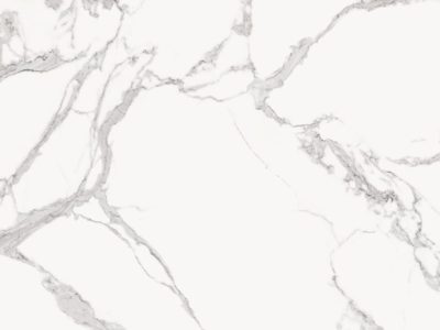 Close-up of Statuario Venato marble featuring a bright white background with soft gray veining and elegant natural stone detail.